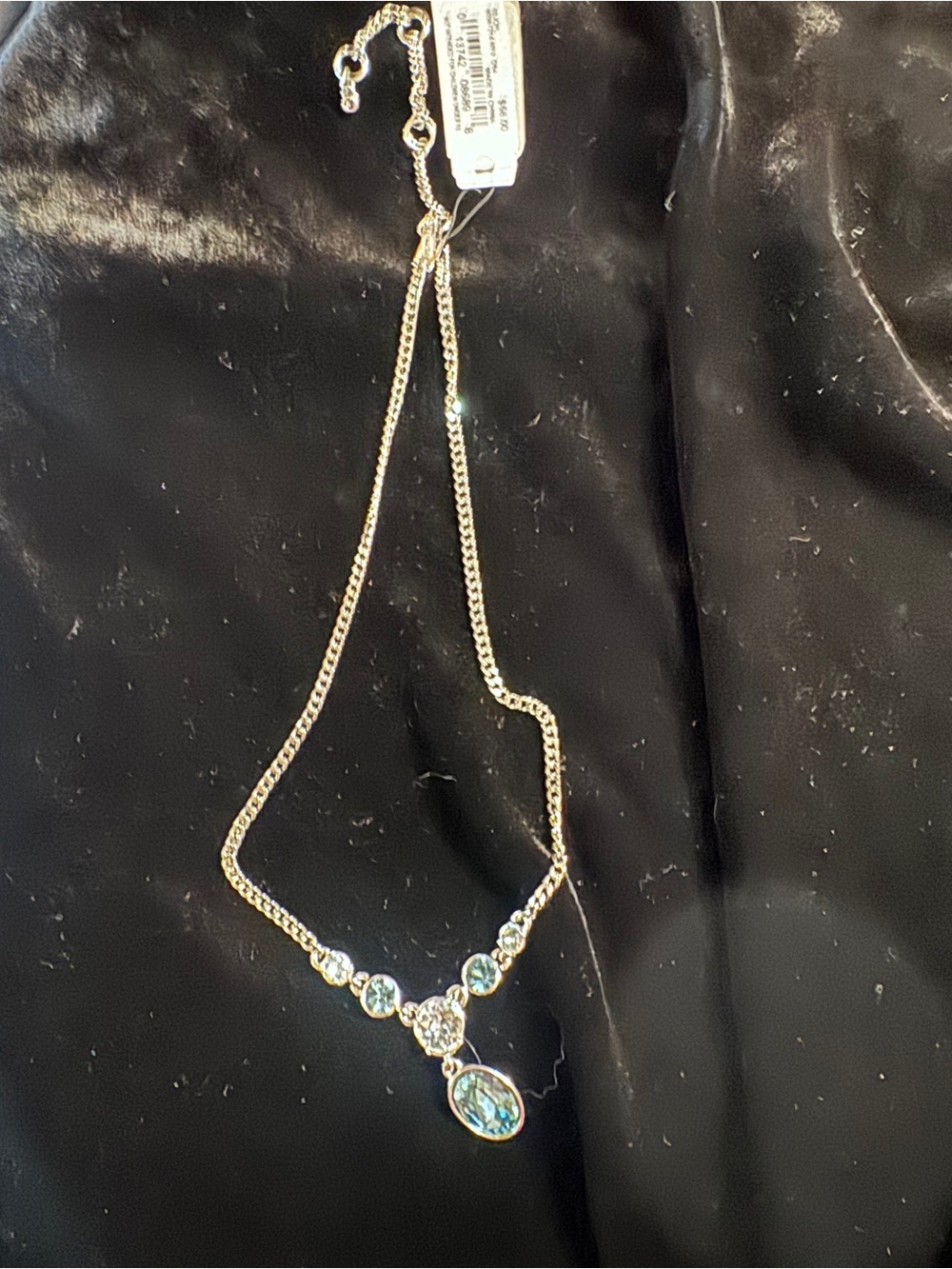Givenchy silver tone necklace with aqua crystal, new with tag .
